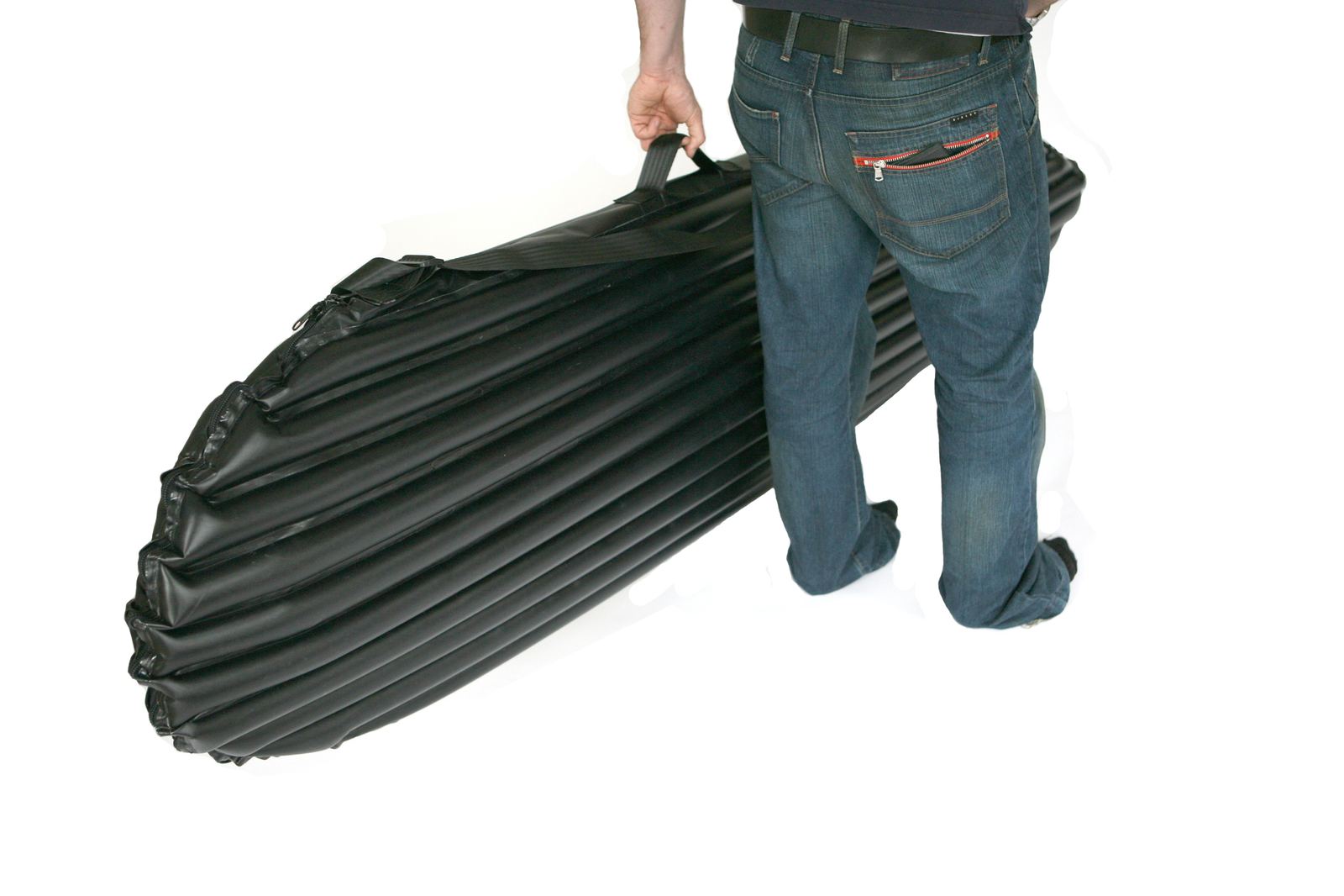 The cover being carried by its shoulder strap